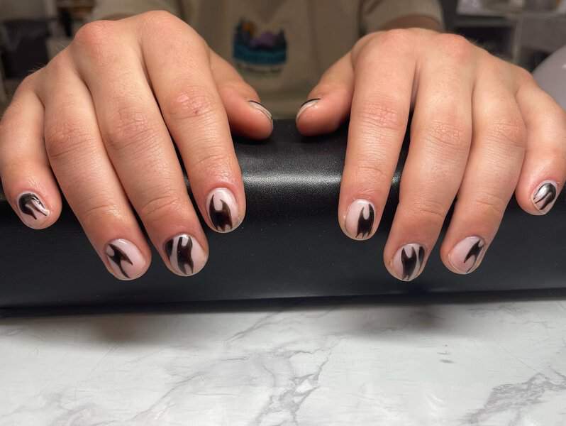 Black and white swirl nail art