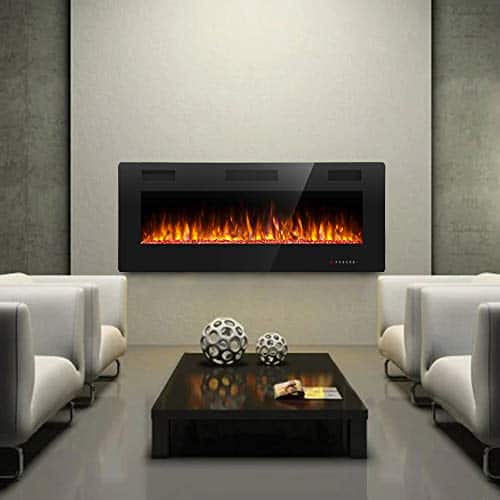 Wall-mounted electric fireplace with orange flames in a modern minimalist living room.