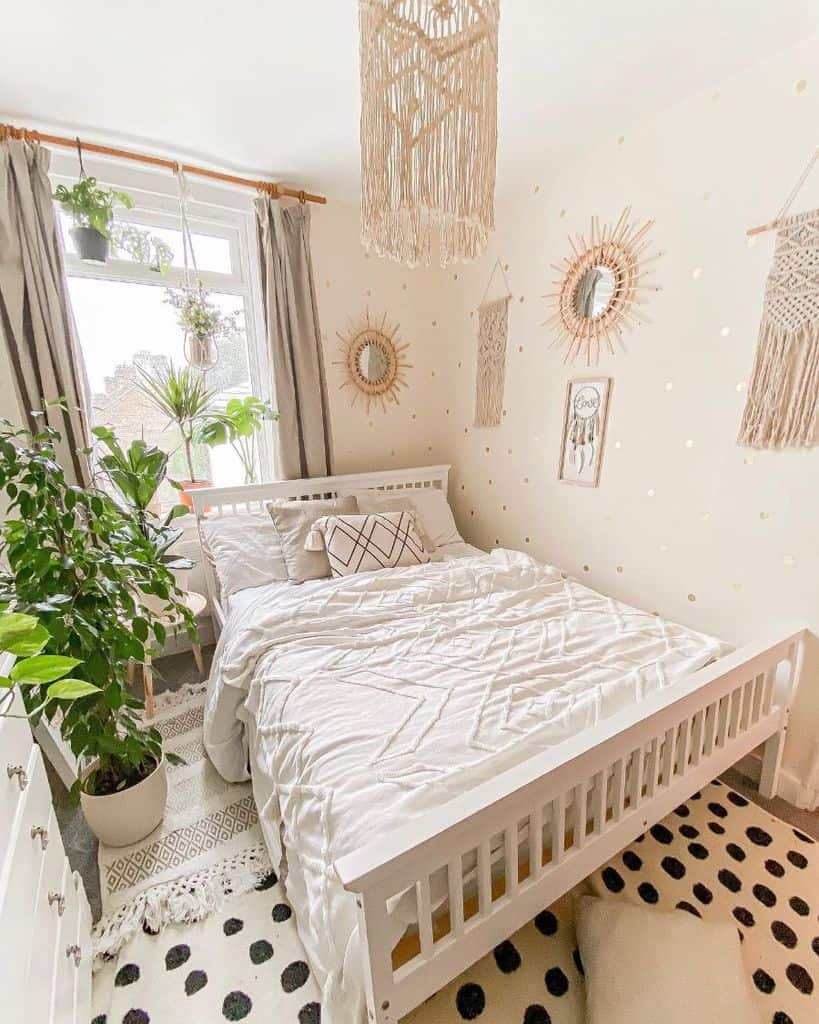 Cozy boho bedroom with macramé details, hanging plants, and earthy decor accents.