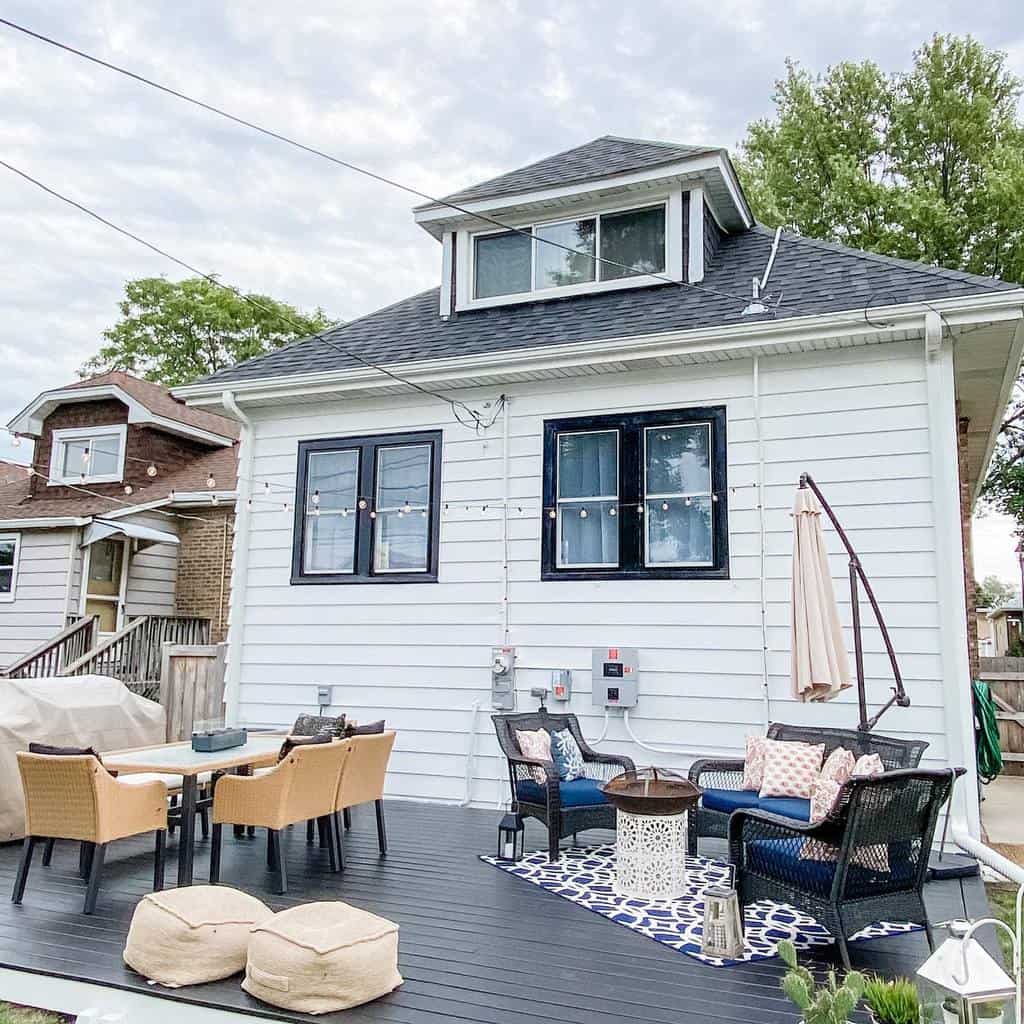 wood deck backyard patio with wicker furniture 