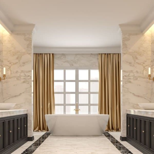 Modern bathroom with freestanding tub, gold curtains, and marble walls for an elegant look.