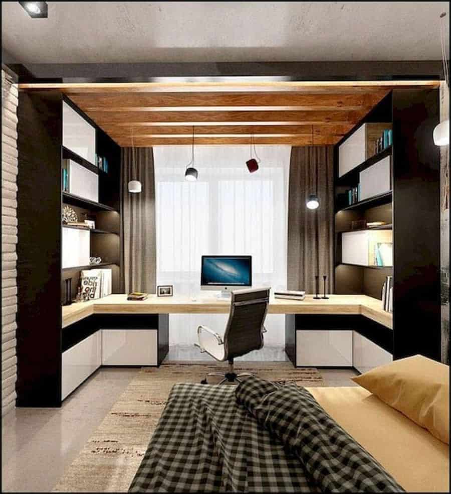 Modern bedroom with built-in desk, storage shelves, and wood beam ceiling.