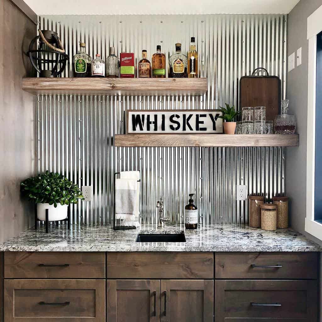 Rustic wet bar with corrugated metal backsplash, wooden shelves, whiskey decor, and granite countertop.