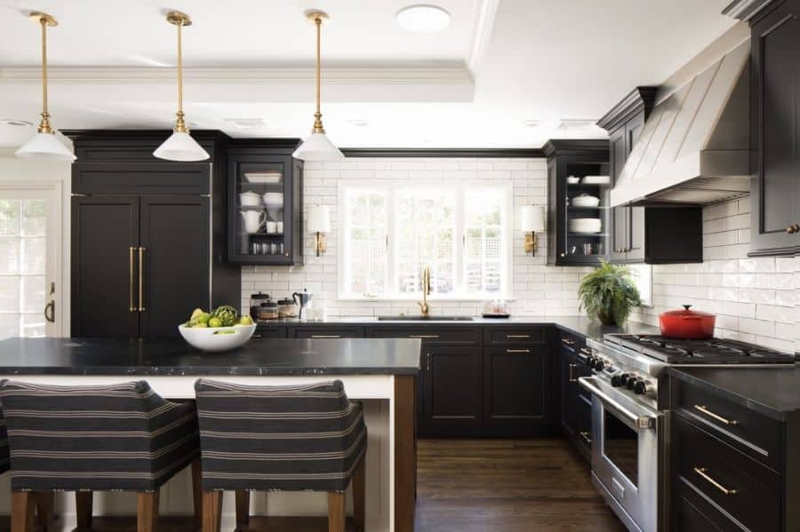 large modern black cabinet farmhouse kitchen with white tiles 