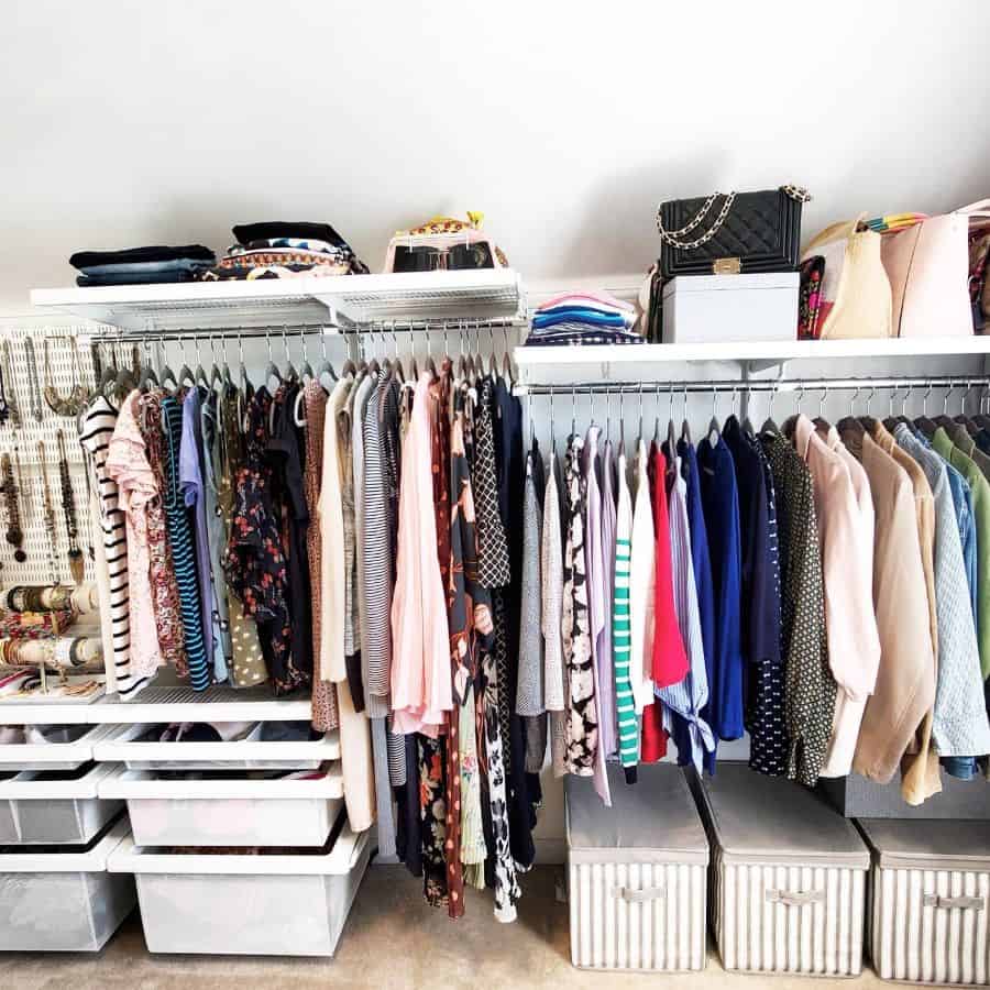 Organized closet with hanging racks, storage bins, and shelving for clothes and accessories.