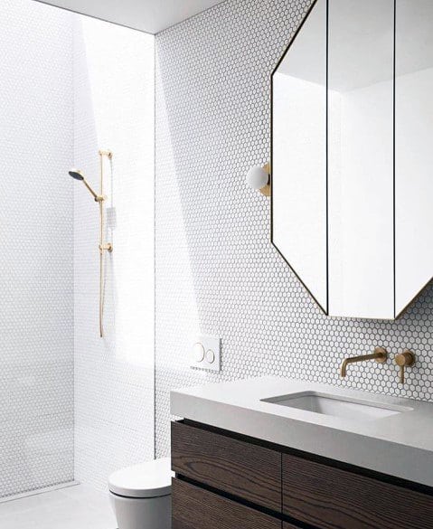 Bathroom with mosaic tile backsplash, floating wood vanity, and walk-in shower.