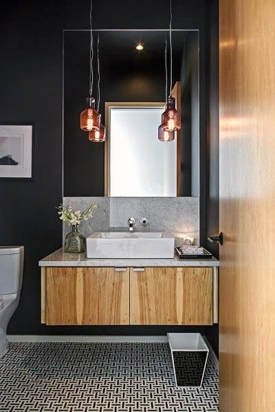 Modern bathroom with a wooden cabinet, square sink, and pendant lighting