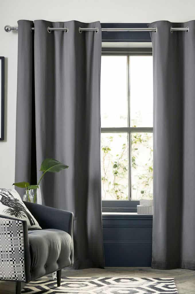 living room with gray curtains 