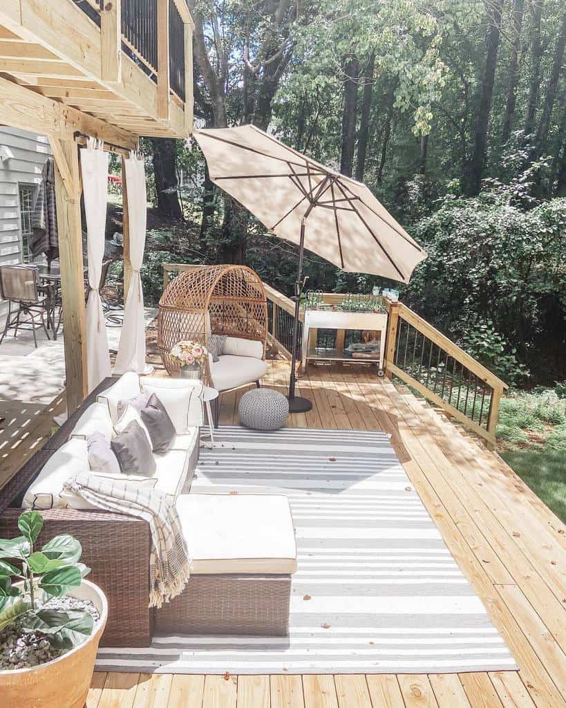 diy backyard wood deck wicker sofa umbrella 