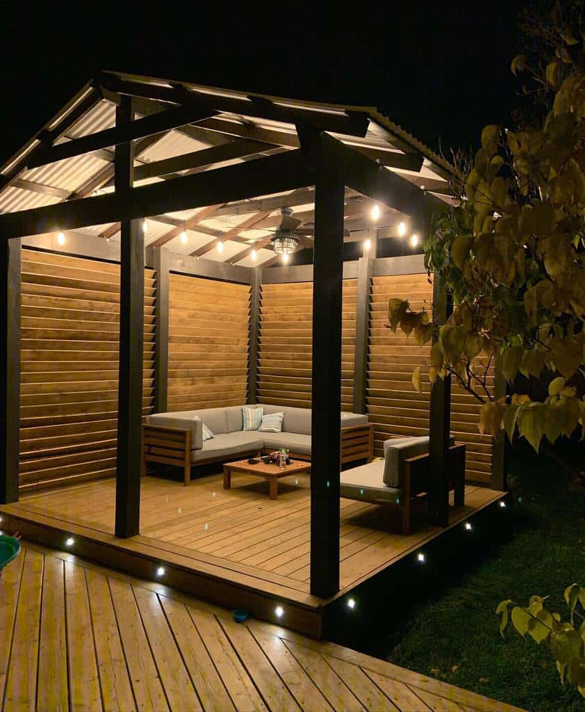 wood deck pergola fan wood sofa and table skirting lights