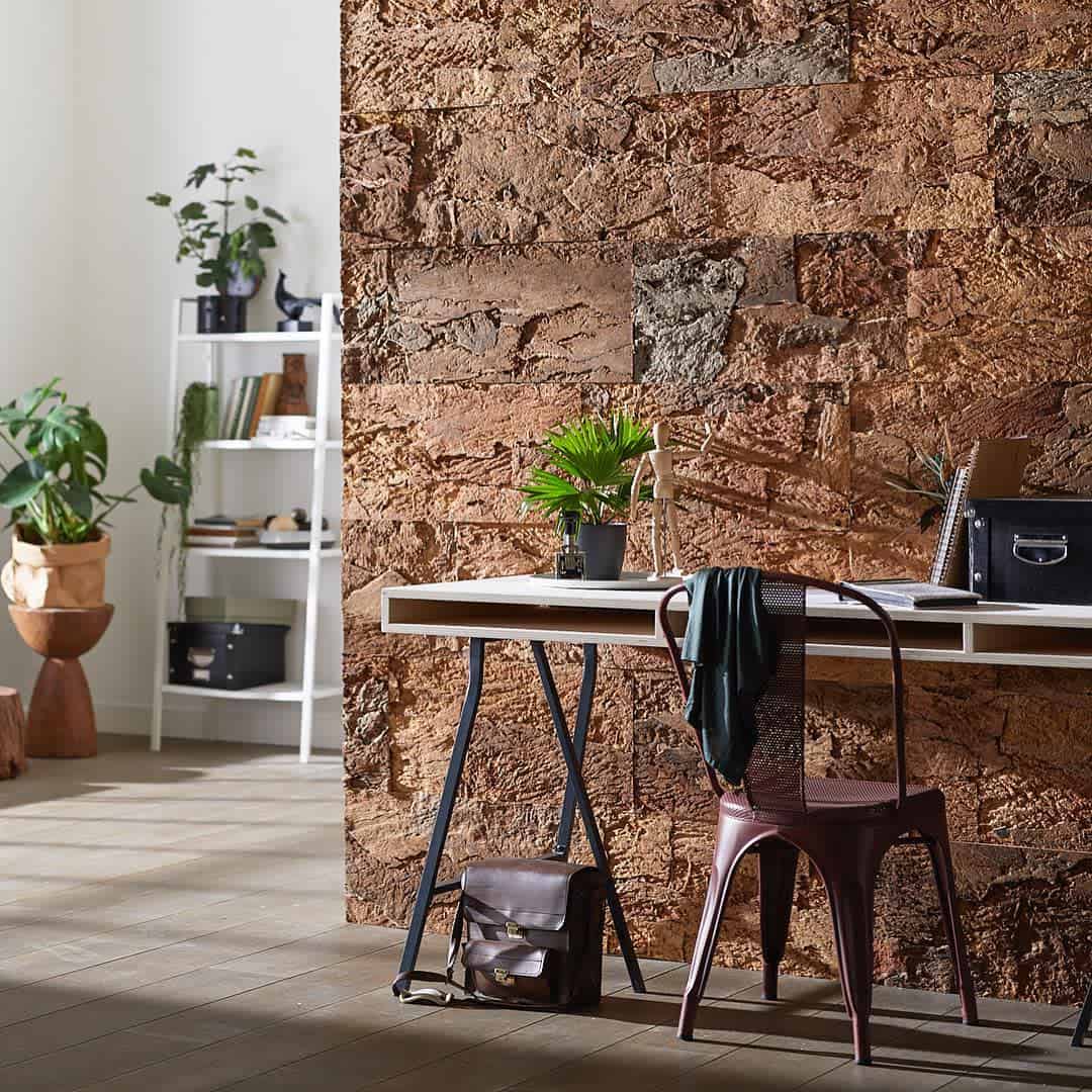 stone wall with desk and chair 