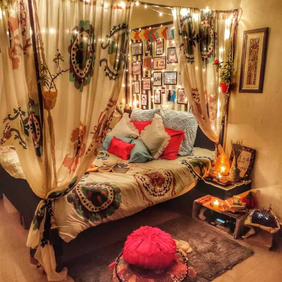 Cozy boho bedroom with sheer curtains, string lights, colorful pillows, and warm decor accents.