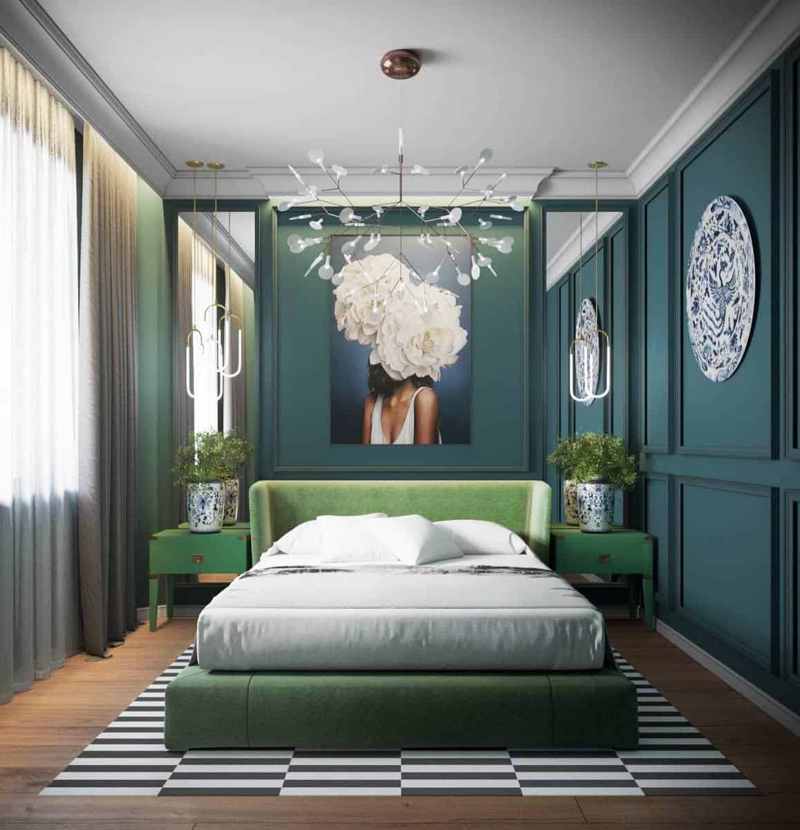 Stylish bedroom with green bed, large artwork, chandelier, patterned rug, and plants by the bedside tables