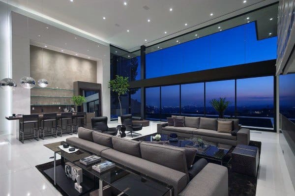 luxury modern apartment living room with ceiling to floor windows and wet bar 