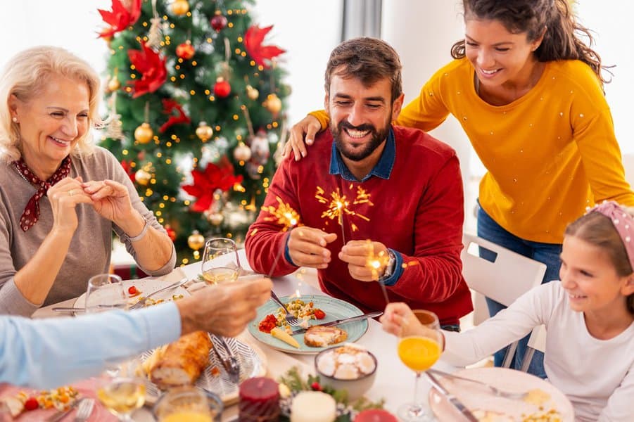 family having christmas lunch at home