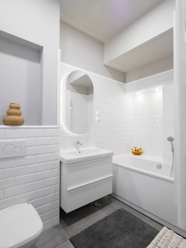 minimalist white tile small bathroom