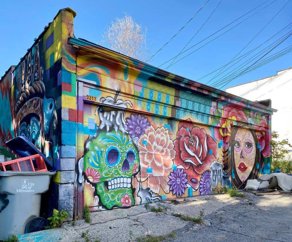 colorful mexican themed garage wall mural with skull and roses 