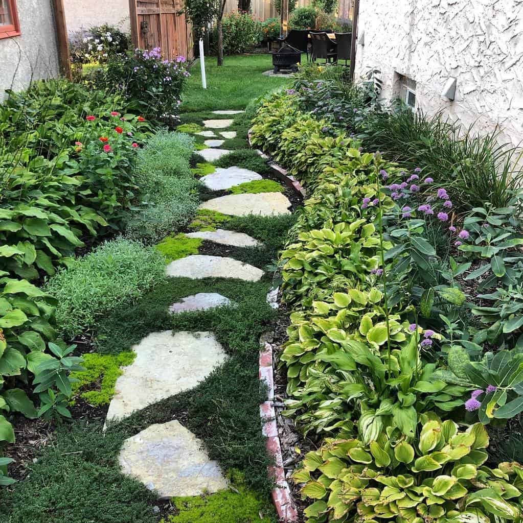 stone garden path in narrow backyard 