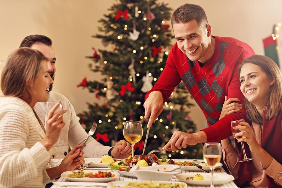 group of friends celebrating Christmas at home