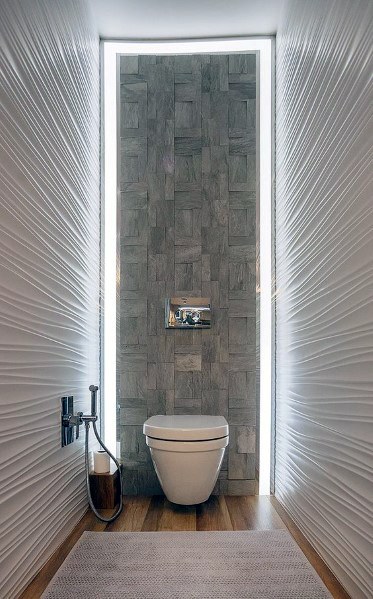 modern narrow toilet with textured walls 