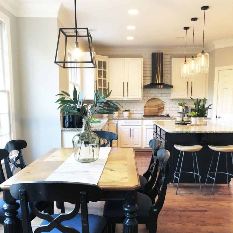 black and white industrial rustic kitchen with track lighting 