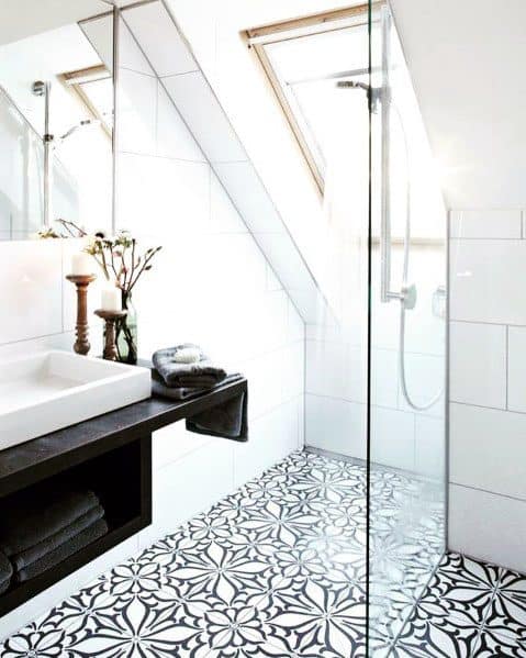 attic bathroom walk-in shower black and white pattern floor tiles candlesticks 