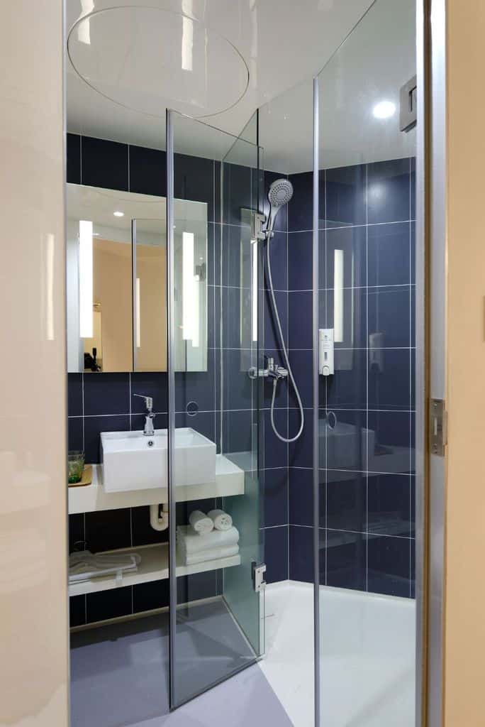 blue tile corner glass shower 