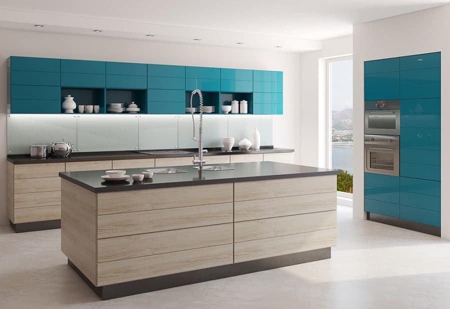 Modern kitchen with blue and wooden cabinets, spacious island, stainless steel appliances, large window view