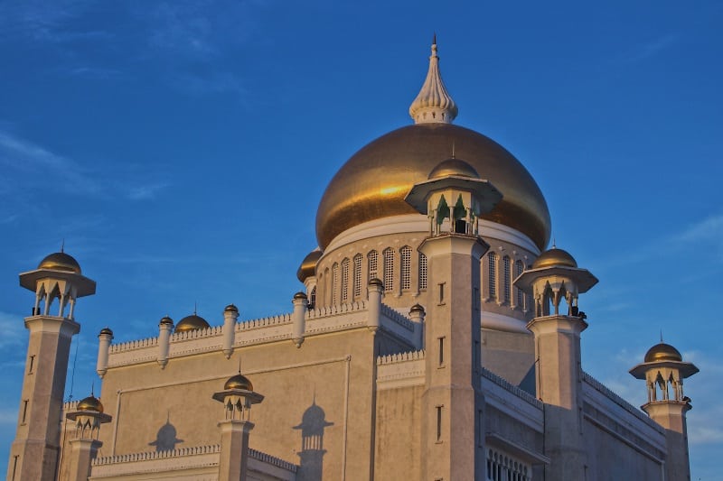 Istana Nurul Iman Palace with a golden dome and ornate towers.