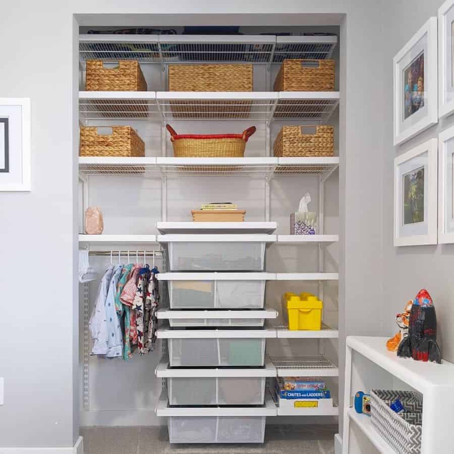 Neatly organized closet with baskets, pull-out drawers, and hanging space for kids' clothes.