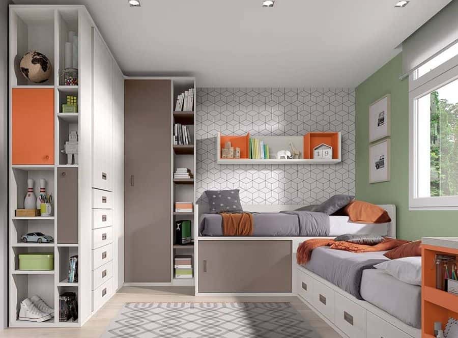 Kids' room with twin beds, under-bed storage, large wardrobe, and geometric wallpaper.