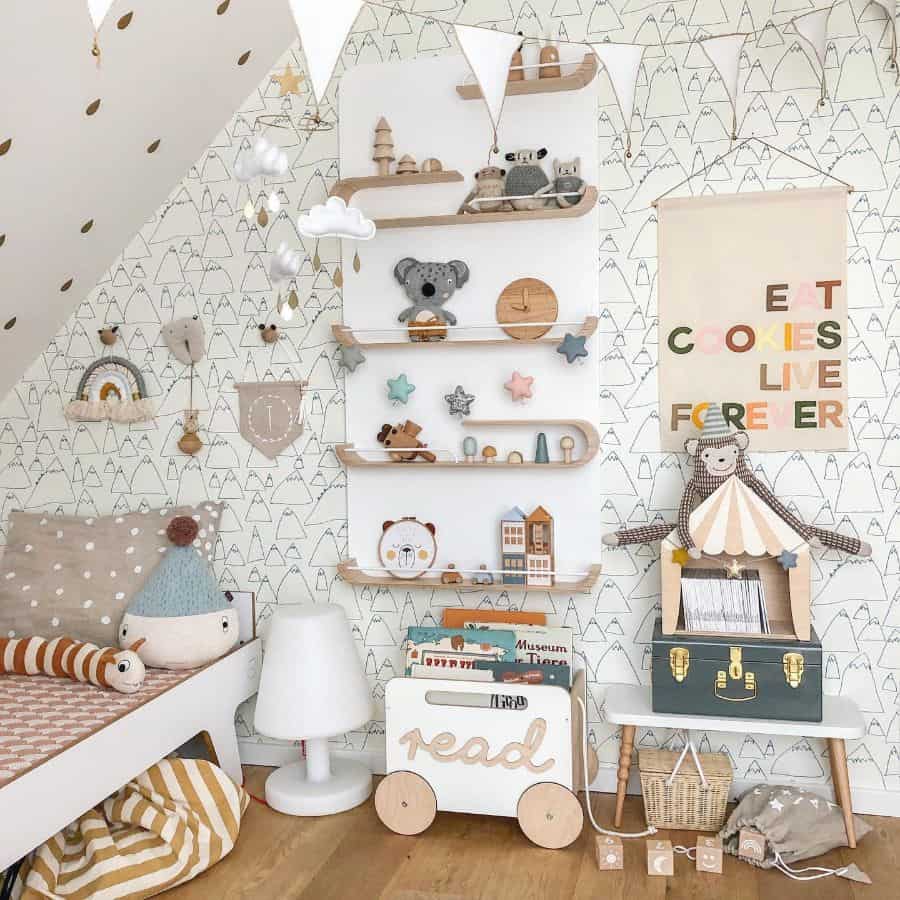 Kids' bedroom with whimsical wall shelves, cozy decor, and reading cart.