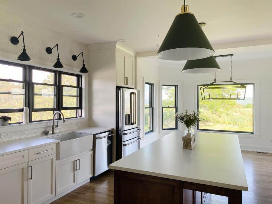 large white cabinet kitchen with apron sink and island 