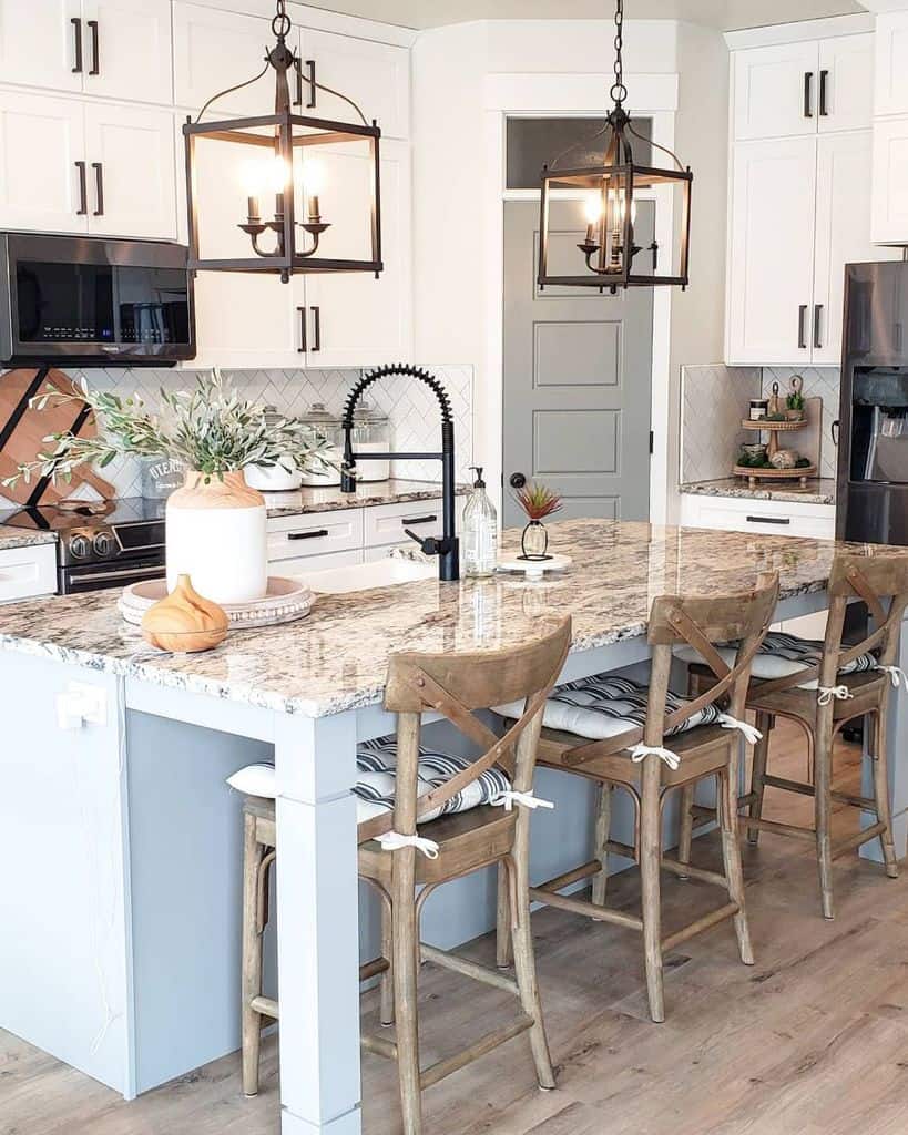 country style farmhouse kitchen with white cabinets and lantern pendant lights 