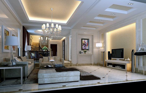 Luxurious living room with elegant chandelier, beige sofas, TV, and decorative art on walls