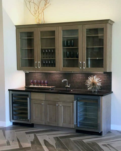 Luxury Metal Backsplash With Wood Cabinets And Hardwood Floors