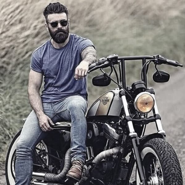 Man In Blue Shirt With Jeans With Awesome Beard Style