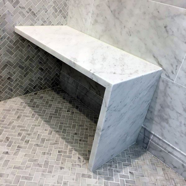 Marble Shower Bench Seat Ideas With Herringbone Tile Flooring