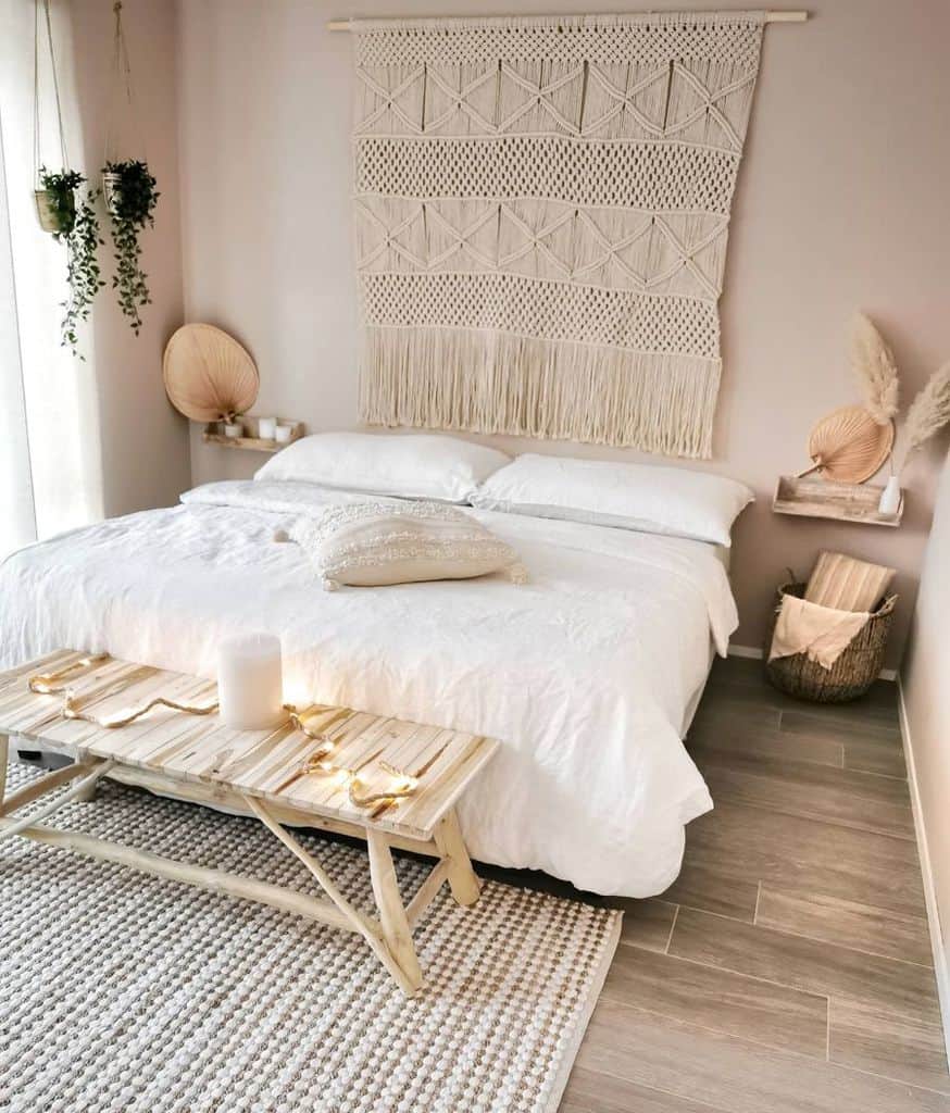 Minimalist boho bedroom with neutral tones, macramé, and natural accents.