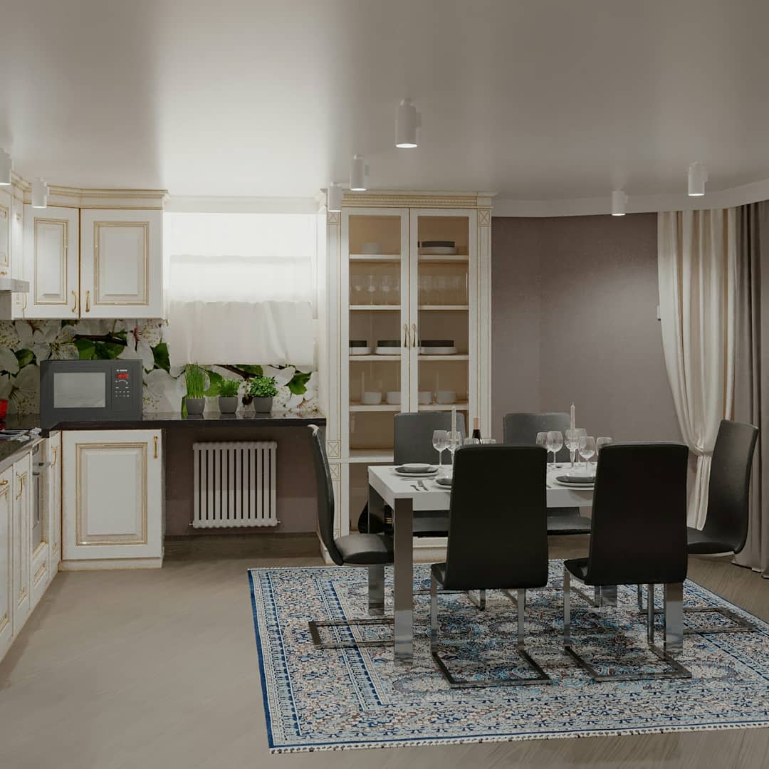 Modern basement kitchen with white cabinets, dining area, and decorative floral backsplash.