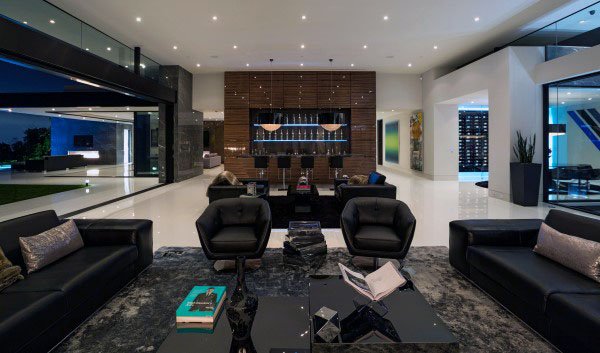 large luxury living room black sofas wet bar