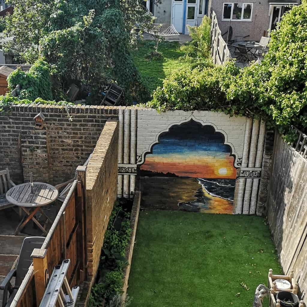 backyard beach mural painted on wall 