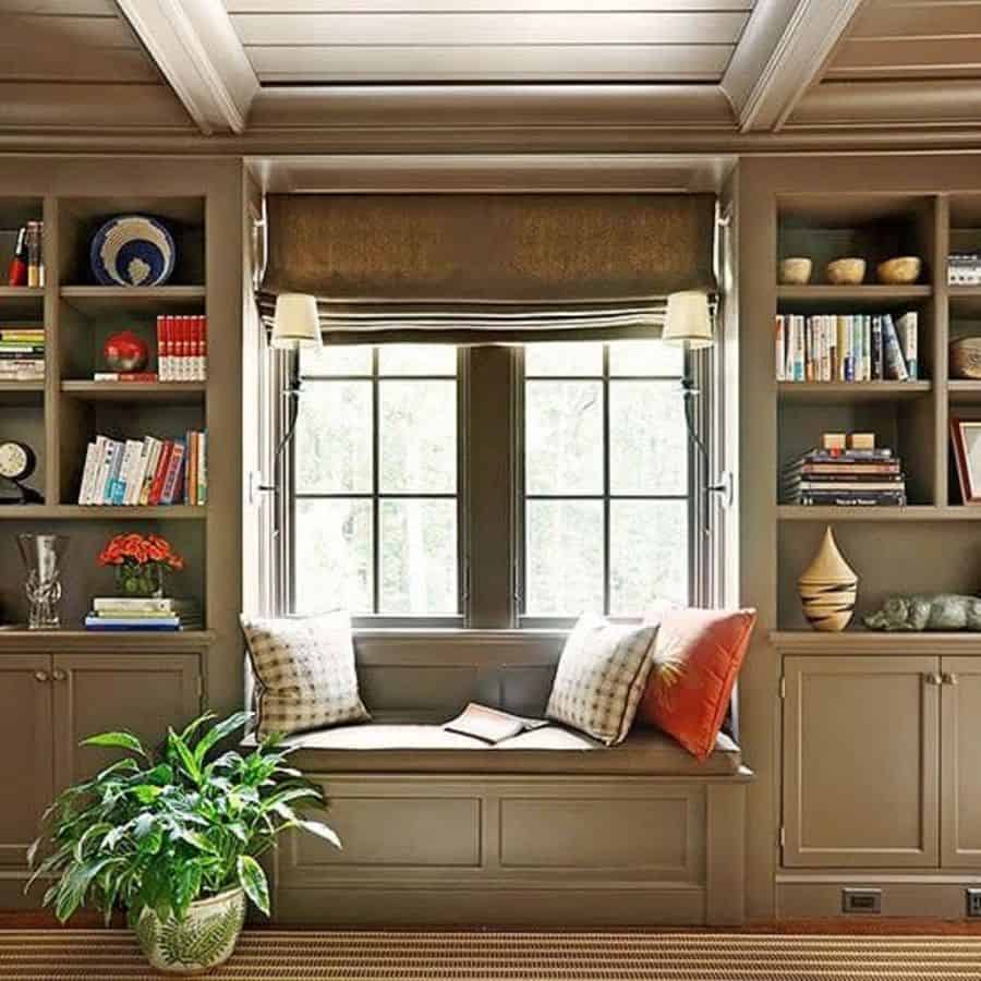 reading nook gray cushions book shelves pot plant 