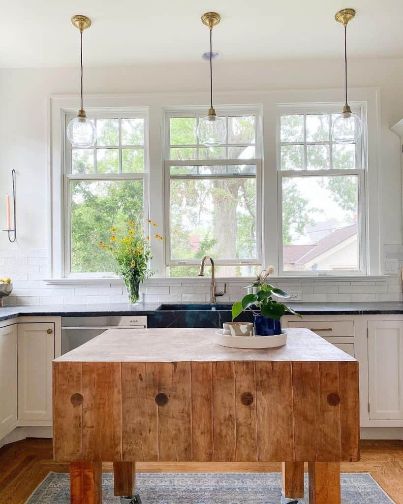 farmhouse kitchen with wood island 