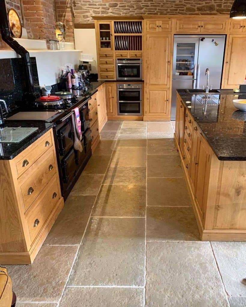 reclaimed wood cabinet kitchen in country kitchen with slate flooring 