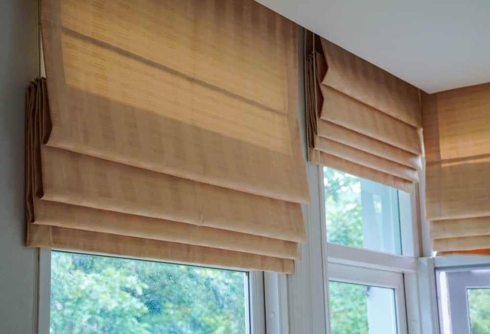 tan color roman blinds 