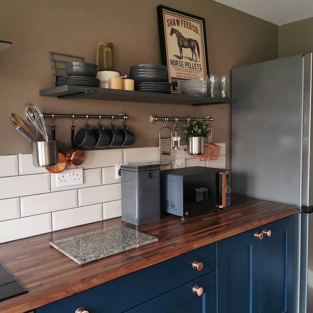 farmhouse style kitchen blue cabinets white subway tile backsplash 