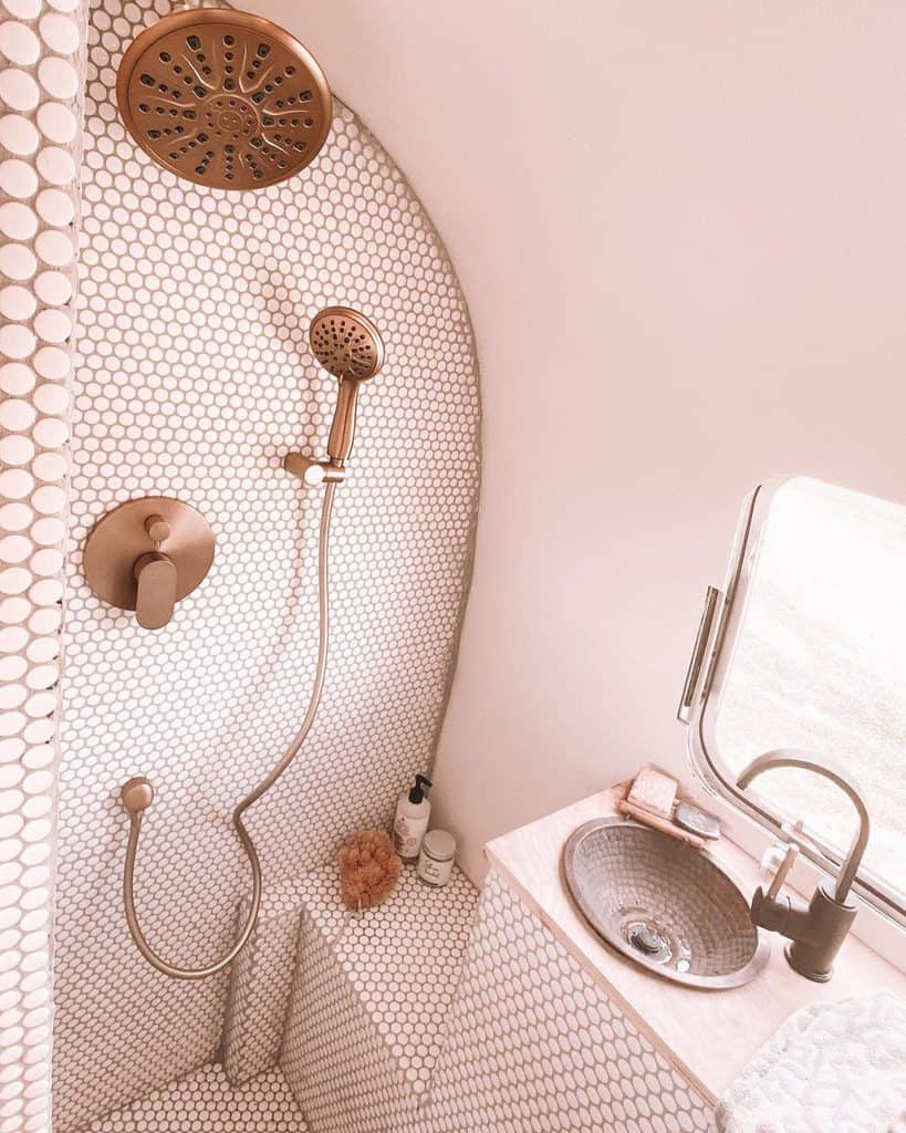 mosaic tile shower in all pink bathroom 