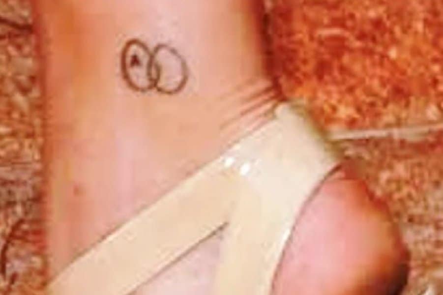 Interlocked Circles With the Letter "A" Tattoo