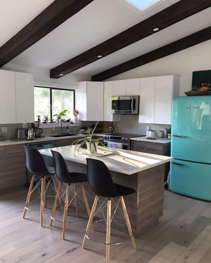 small kitchen with blue retro fridge and island 